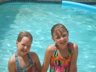 Kenzie &amp; Shelby enjoying the pool.