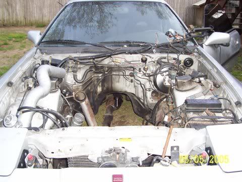 http://i27.photobucket.com/albums/c166/mk3jessiel/emptyenginebay.jpg?t=1184643535