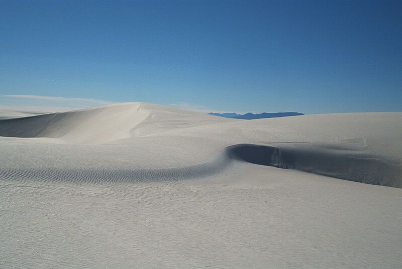 [Image: 800px-Dunes_as_White_Sands_NM.jpg]