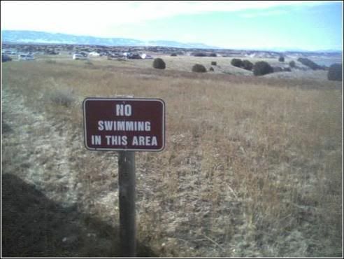 http://i27.photobucket.com/albums/c181/vibratingcow/random%20pix/no_swimming.jpg