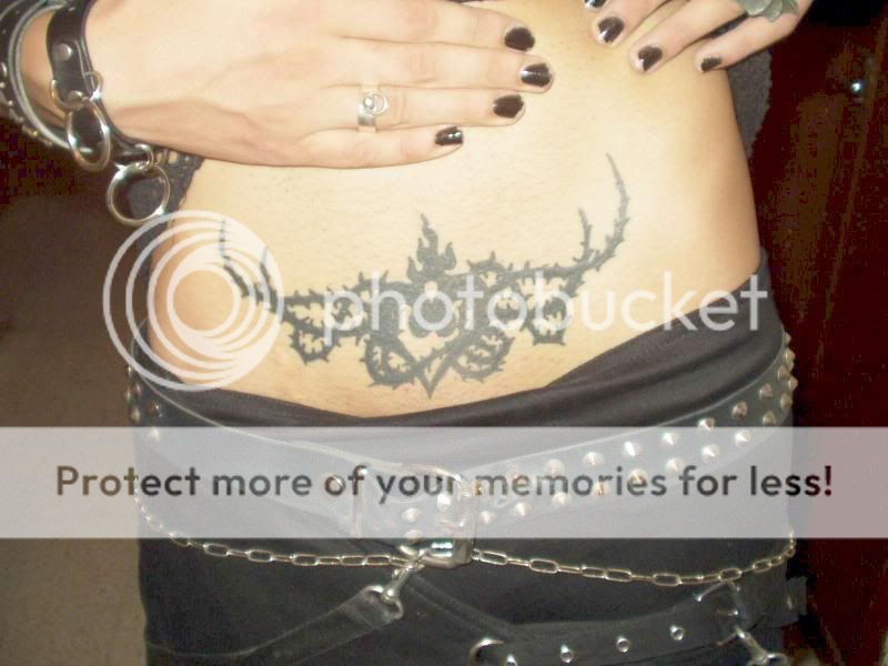 pelvis tattoo close up shot