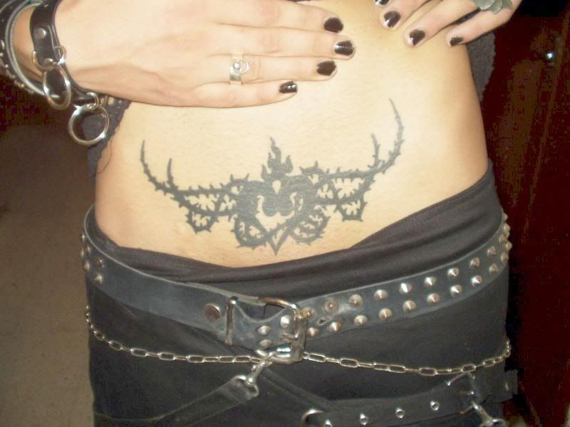 pelvis tattoo close up shot